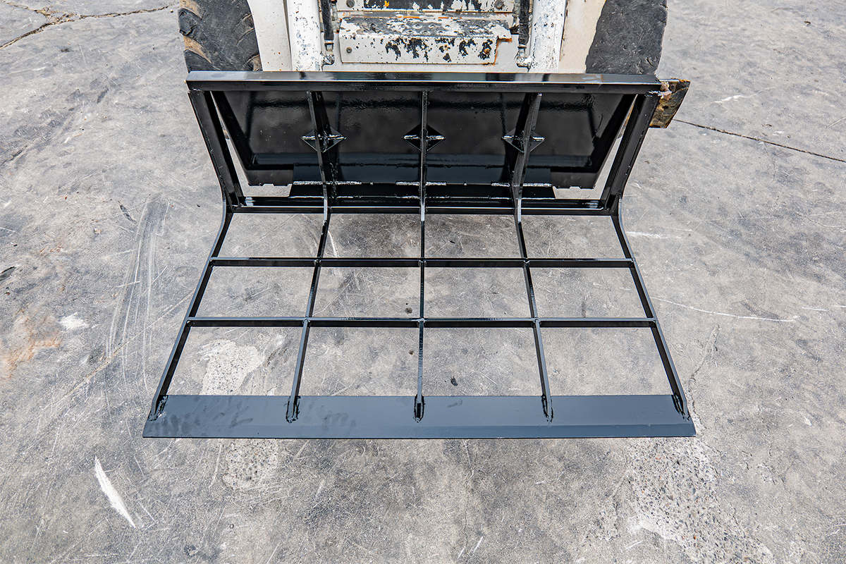 Black skid steer loader land leveler attachment with steel grid frame