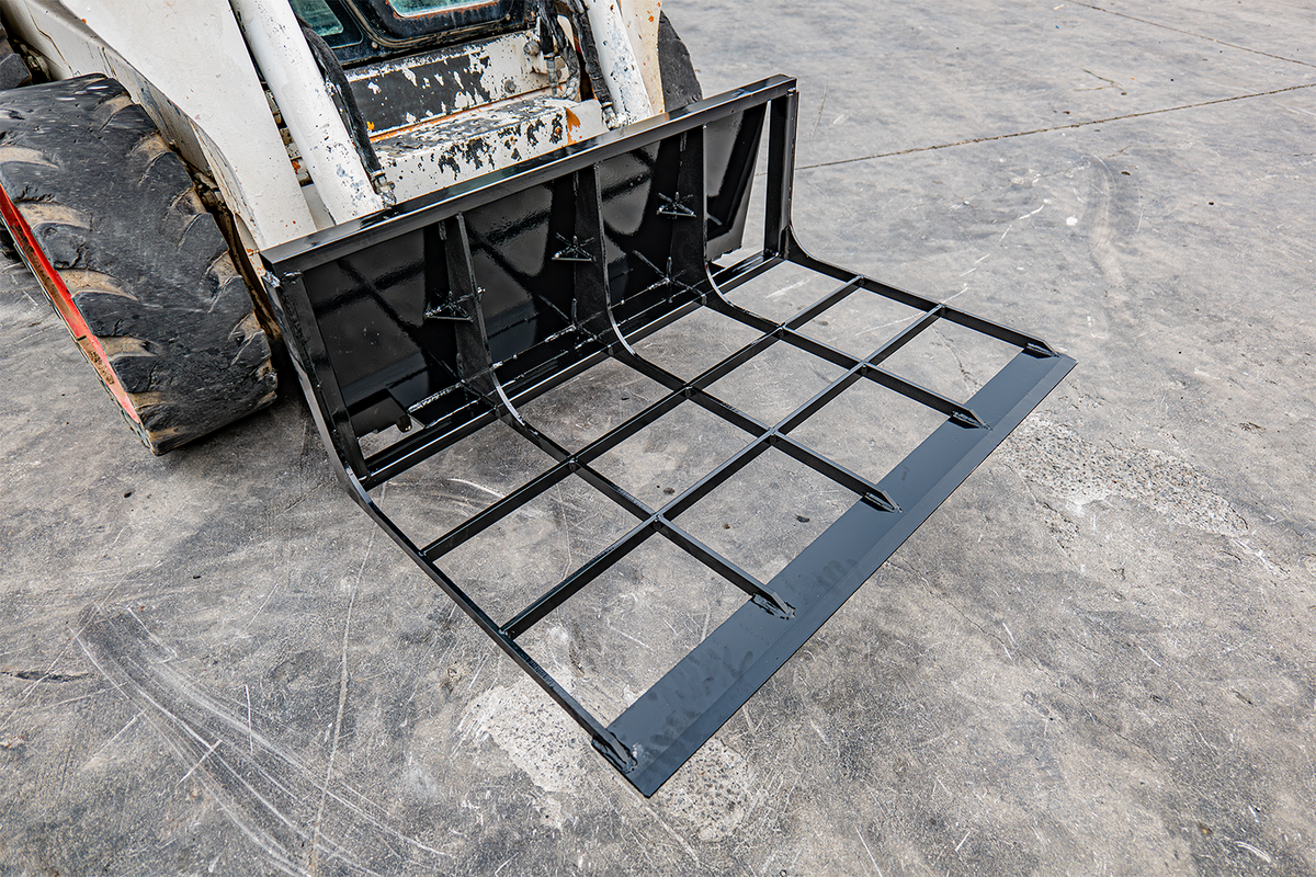 Black skid steer loader land leveler attachment with grid frame and reinforced steel edge