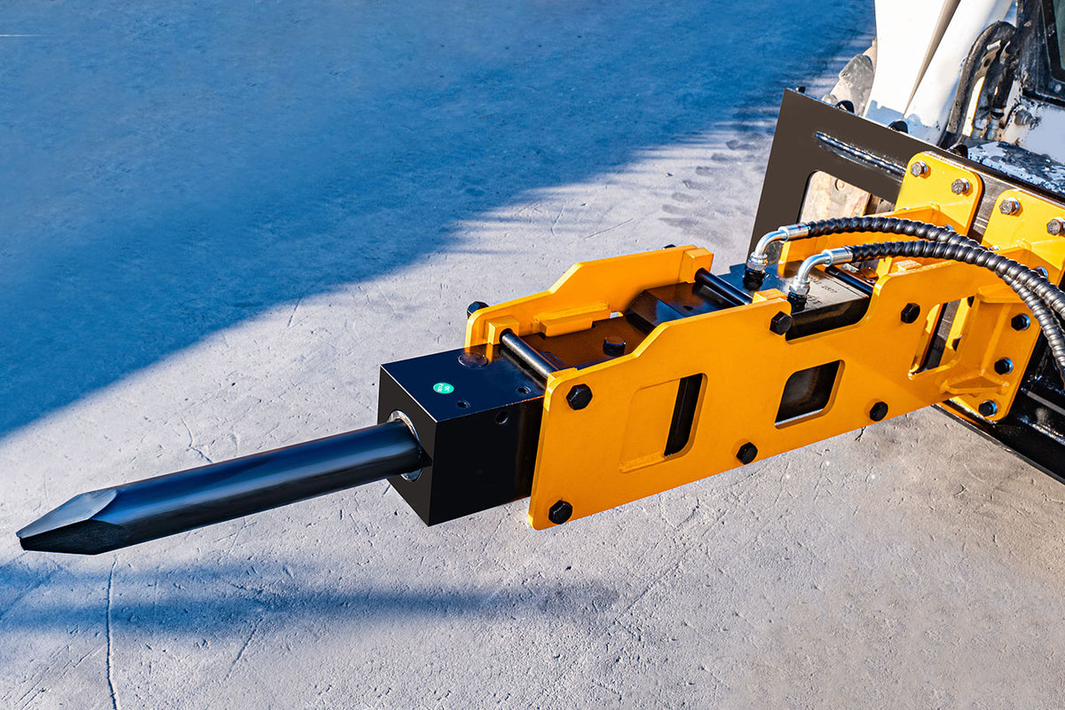 Hydraulic hammer breaker attachment with steel chisel rod for skid steer loader