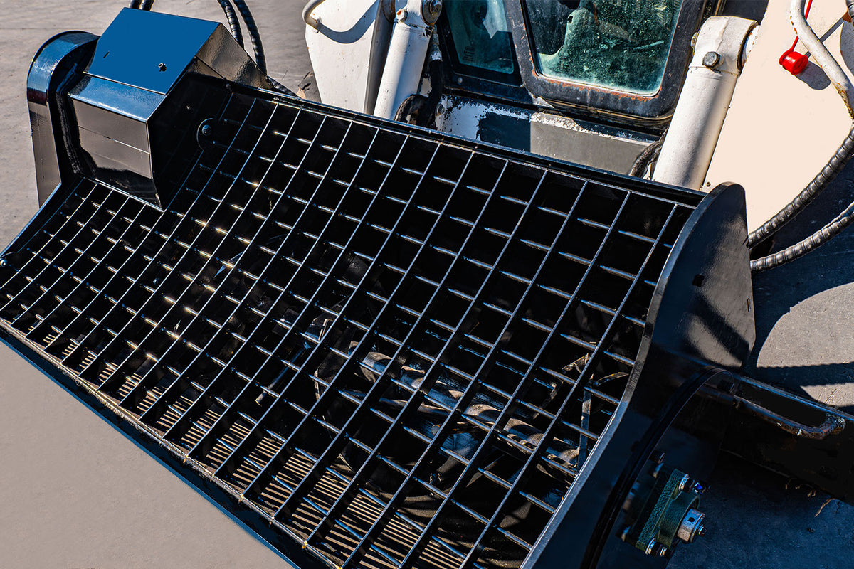 Black 48-inch concrete mixing bucket attachment with steel grid for skid steer loader