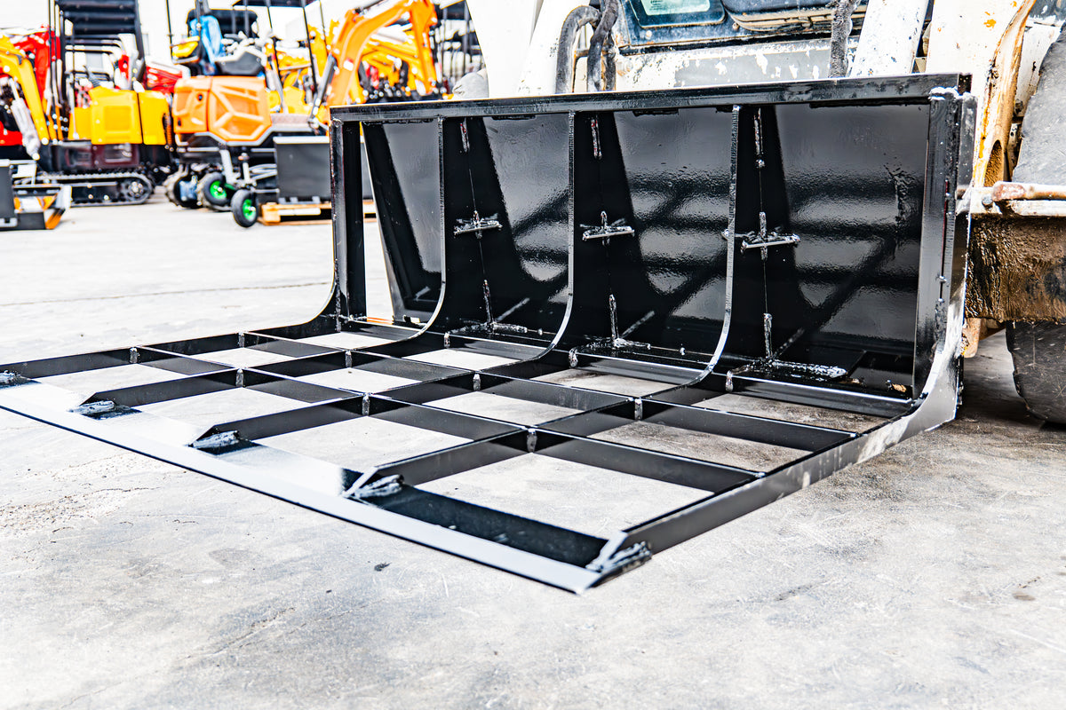 Black skid steer loader land leveler attachment with reinforced steel frame