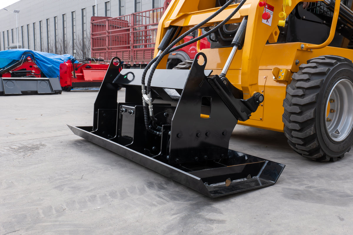 Black skid steer vibratory flat plate compactor attachment on yellow loader